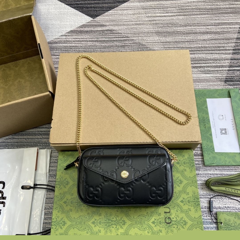G*u*i satchel bags